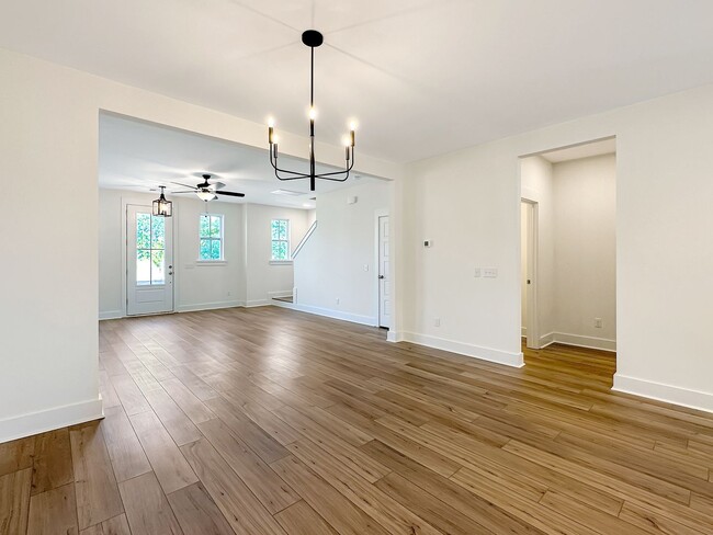 Building Photo - Beautiful, 3-Bedroom Midtown Nexton Townhome with Garage & Amenities