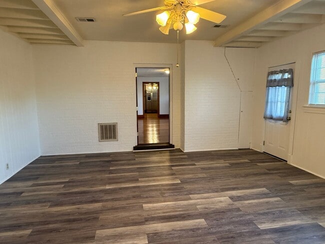 Building Photo - One Level Home! 3or 4 bedroom 1 bath with extra-large den, garage and extra storage on almost an ...