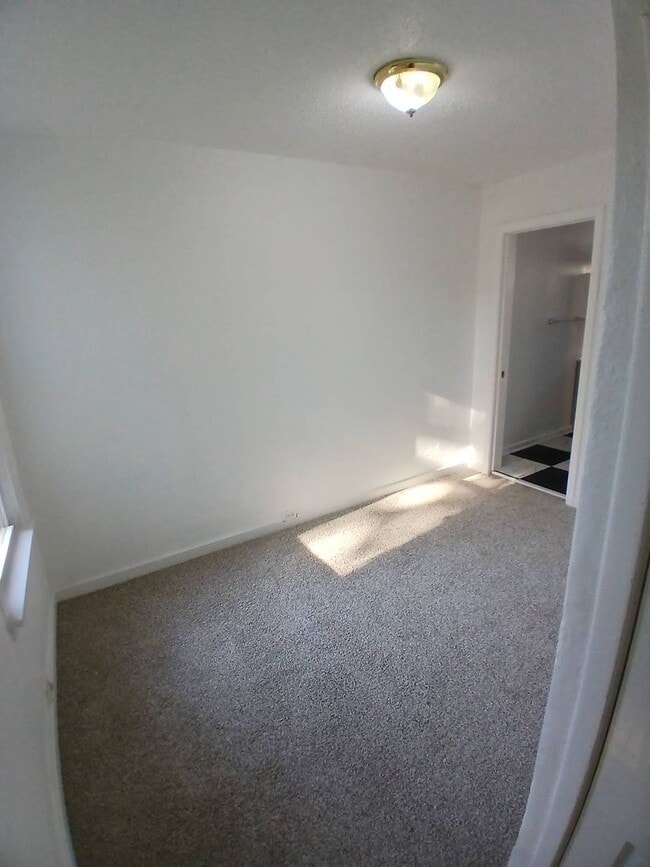 Building Photo - Newly Renovated 4BR/1BA Single-Family Home with Garage – Cleveland