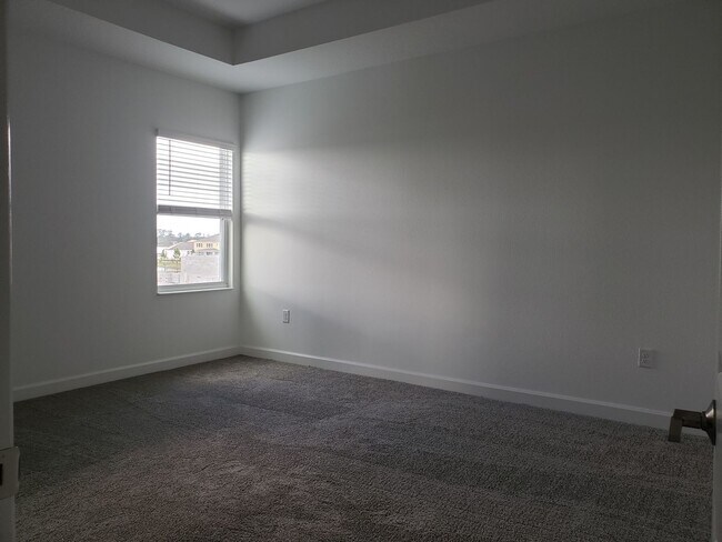 Building Photo - Bridgewalk Corner Lot Home with Wooded View and Solar Panels