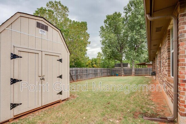 Building Photo - 10517 Queensbury Dr