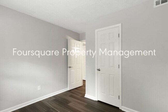 Building Photo - Charming 1st-Floor End-Unit Condo with Gas Log Fireplace, Private Back Porch & Community Pool – T...