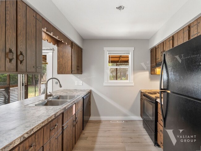Building Photo - Charming Three-Bedroom, Two-Bathroom Ranch...