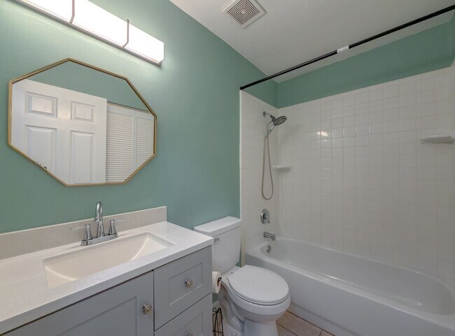 Building Photo - LOVELY & Modern NW 2/1 w/ New Flooring & Huge Privacy Fenced Yard that Inc Lawn Maintenance! Avai...