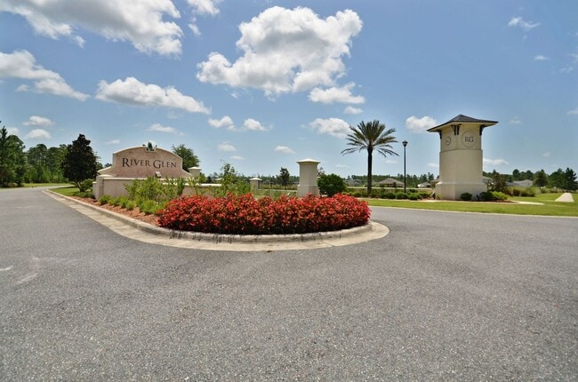 Building Photo - Modern 4BR Home with 3 Full Baths in River Glen | Screened Porch & Resort-Style Amenities