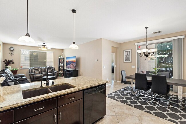 Building Photo - Welcome Home! This stunning 4 bedroom, 3 b...