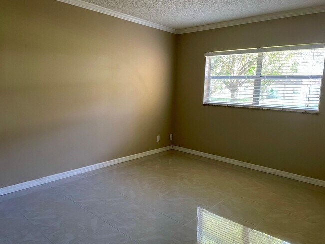 Building Photo - 608 SW Natura Blvd