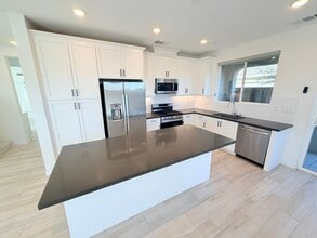 Building Photo - Beautifully upgraded home in the desirable Le Campanile Community