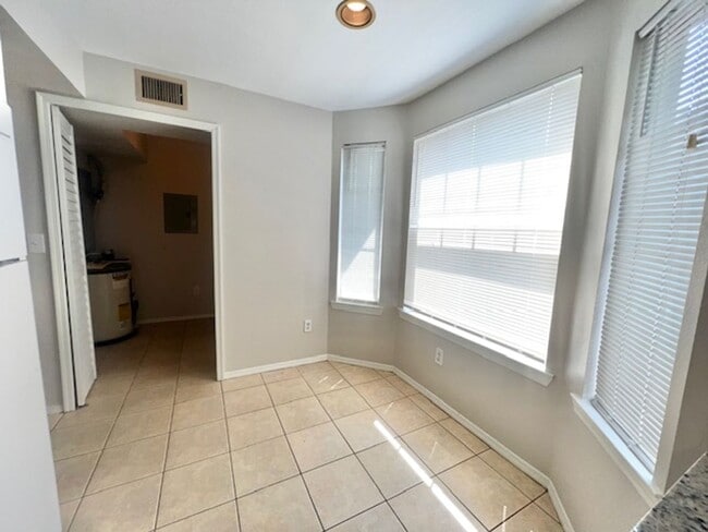 Building Photo - NEW-Remodeled bathroom & kitchen! NEW VINYL PLANK flooring & fresh paint! 2 bedroom 1 bath condo ...