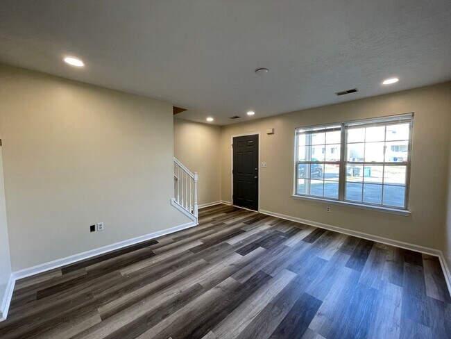 Building Photo - COMING SOON! Beautiful Townhouse! All Electric, Off-Street Parking, Washer/Dryer