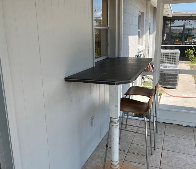 Building Photo - Lost in Paradise USA LLC