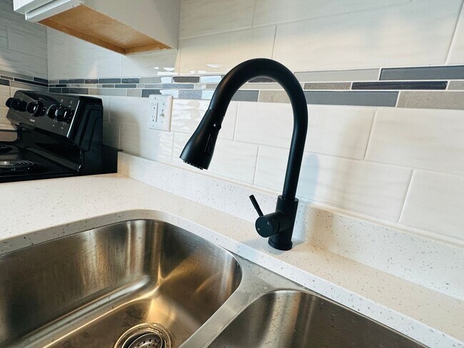 Building Photo - Experience Luxury Living at Park Harrison:...