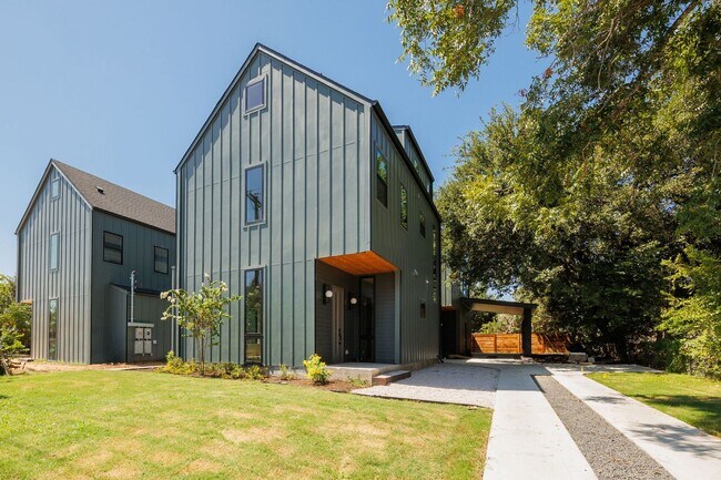 Building Photo - Luxury Redefined: Experience Vibrant Living in this 3-Bedroom Haven in East Austin