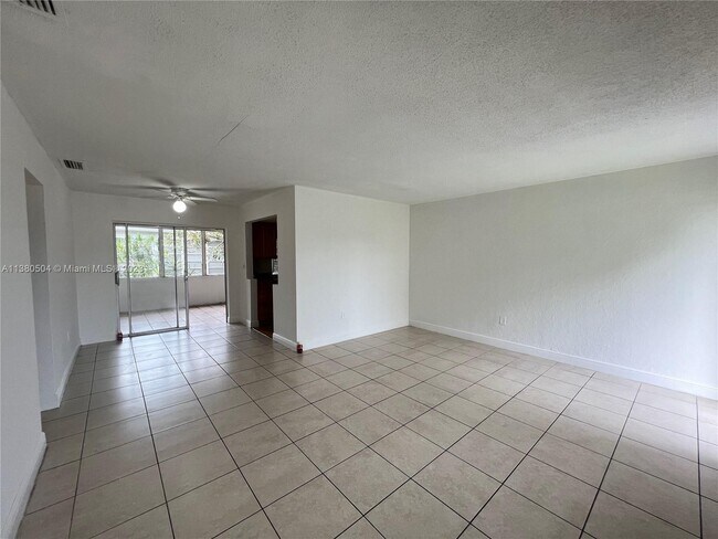 Building Photo - 6886 NW 27th Ct