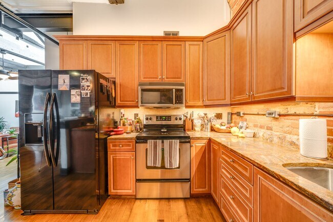 Building Photo - One-of-a-Kind 2BR Condo in Downtown Raleig...