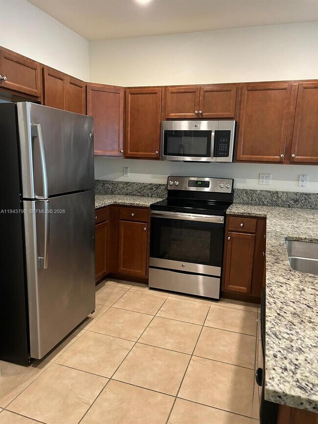 Building Photo - 9332 W 33rd Ln