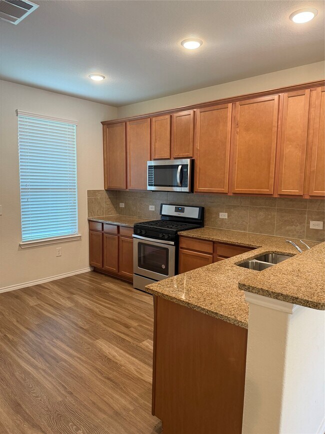 Building Photo - 15843 Grey Boulder Dr