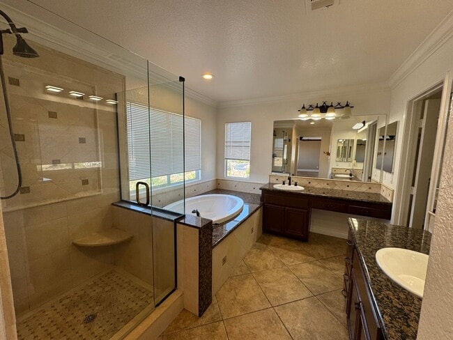Building Photo - Gorgeous for 4 Bedroom and gated community