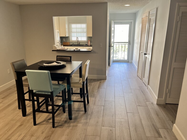 Entry, Kitchen entry; dining area - 800 Coquina Ln