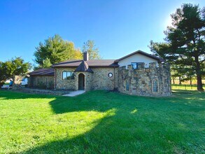 Building Photo - Castle Home Available Now
