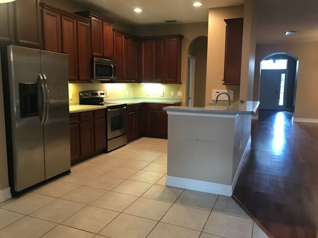 Building Photo - Charming 3/2 home w/ formal office/4th bedroom and fenced yard in Harmony