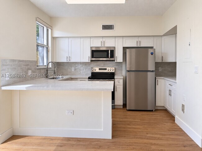 Building Photo - 8745 SW 152nd Ave