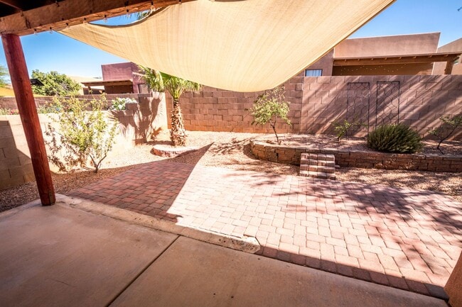 Building Photo - Gorgeous 3 Bedroom 2 Bathroom Home with Tile Throughout! Central A/C, 2 Car Garage!