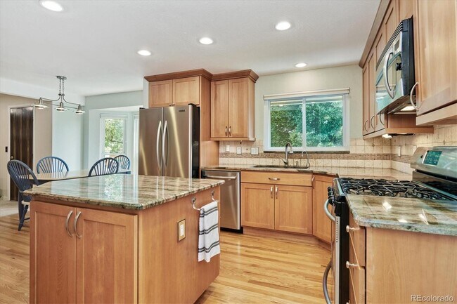 Building Photo - 10725 E Maplewood Dr