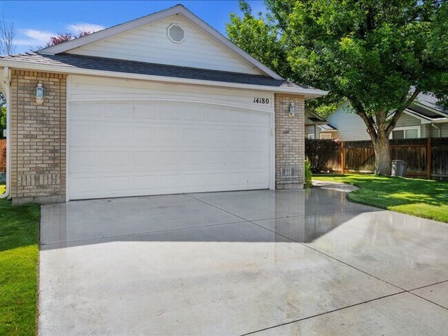 Building Photo - June Rent Free!!  Move Today!  Four Bedroom, Three Bath Home with Beautiful Backyard, Two Car Gar...