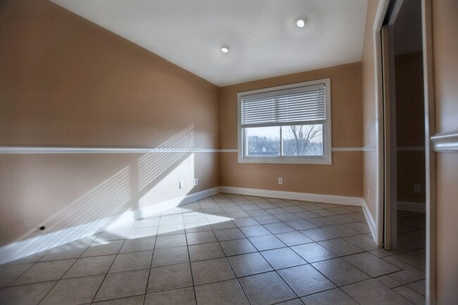 Building Photo - Pet Friendly Three Bedroom with Bonus!