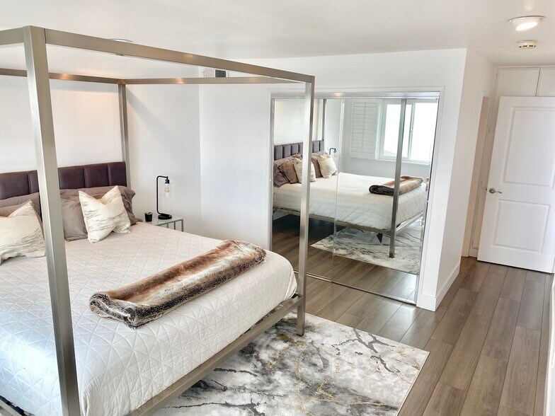 Primary Bedroom with closet space - 18203 Coastline Dr