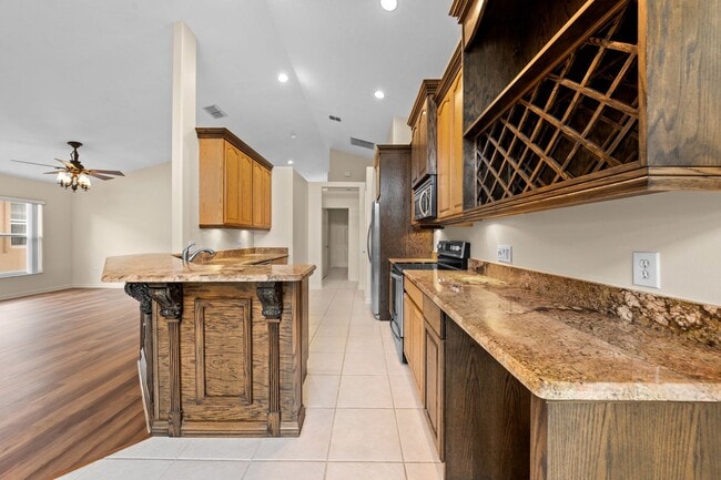 Building Photo - Immaculate 3 Bedroom Home in Gated Community - Stonefield