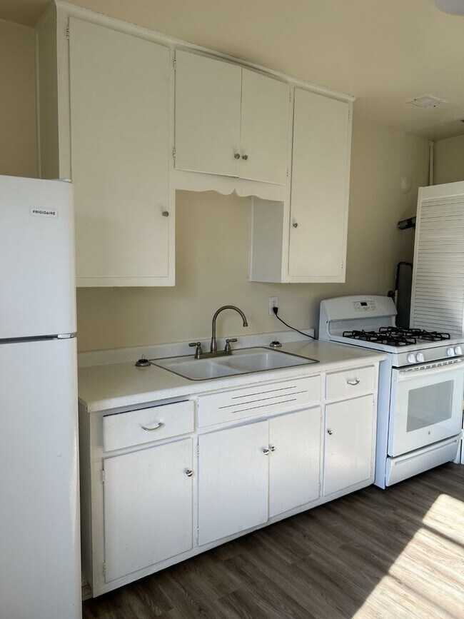 Building Photo - Beautiful Apartment Community with Residential Courtyard