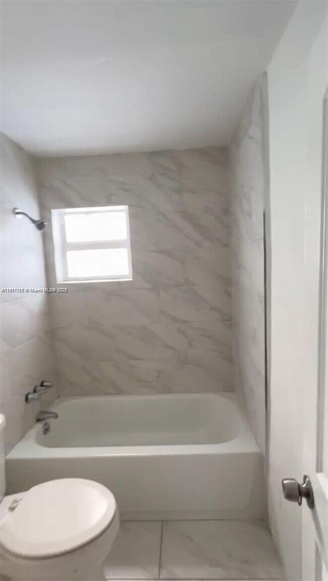 Building Photo - 2864 NW 6th Ct