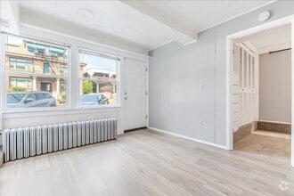 Building Photo - Spacious, Charming Victorian Style Tri-Ple...