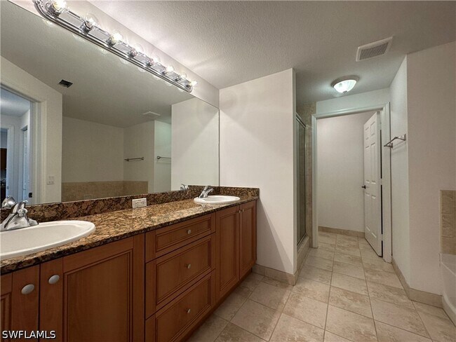 Building Photo - 10101 Villagio Palms Way
