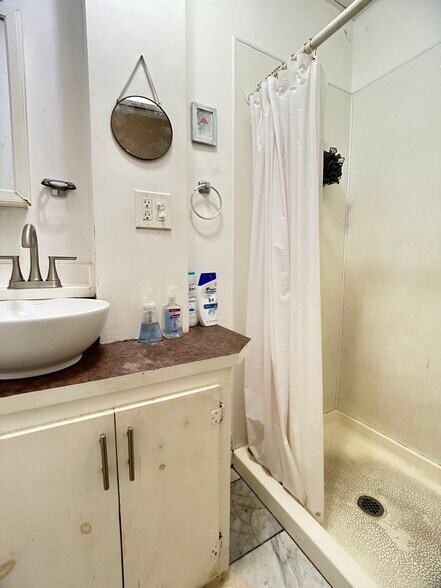 Bathroom picture (shower area) - 67 Holworthy St