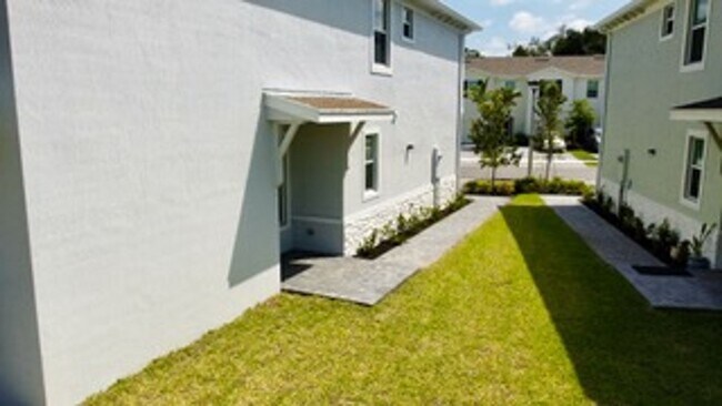 Building Photo - Brand new Townhome centrally located in La...