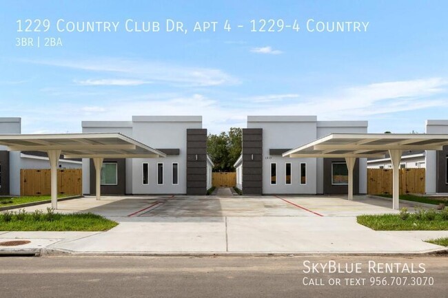 Building Photo - 1229 Country Club Dr