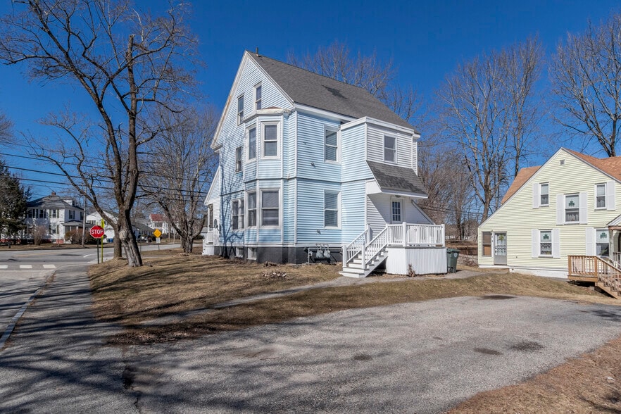 Exterior Back/driveway- This Unit has 2 parking spots - 221 Bridge St
