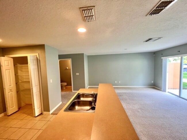 Building Photo - AVAILABLE NOW! Charming 2 Beds 2.5 Bath Townhome! 2 MASTER SUITES! Attached one car garage!! Extr...