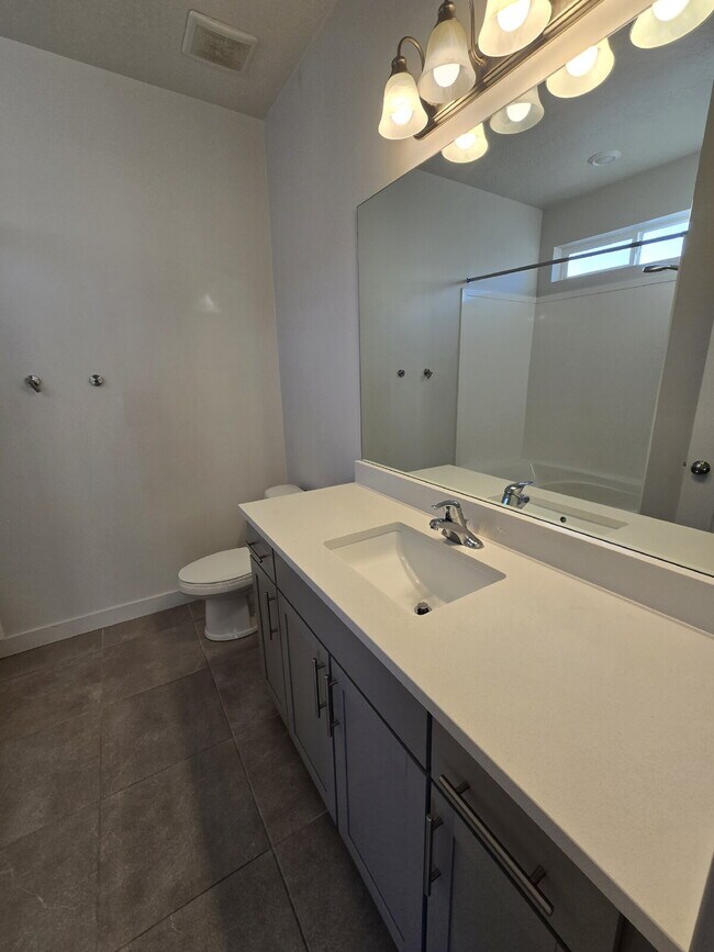 Building Photo - "Chic 3-Bed Townhouse with Pool Access in Bluffdale!"