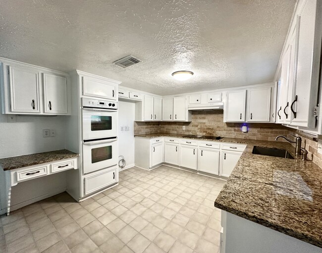 Renovated kitchen area - 15231 Highsprings Dr