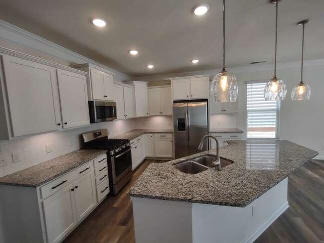 Building Photo - Move-In Ready, End Unit Two Story Townhome...