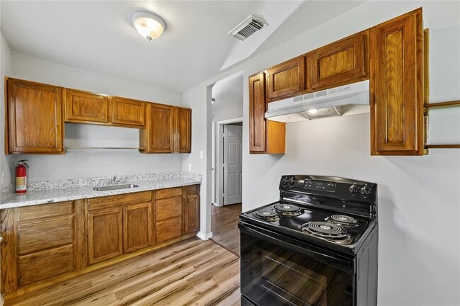 Building Photo - 710 13th St N