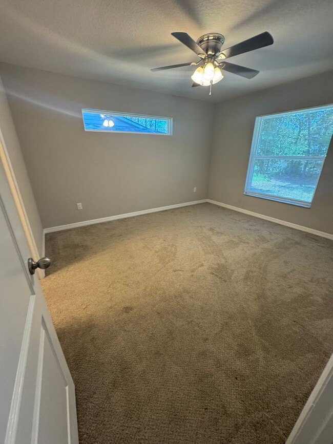 Building Photo - Charming 2BR/2BA Duplex in Citrus Springs - Peaceful Living Awaits!