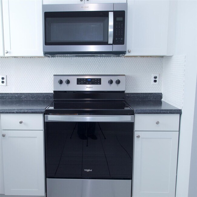 Building Photo - 7355 Woodmont Terrace