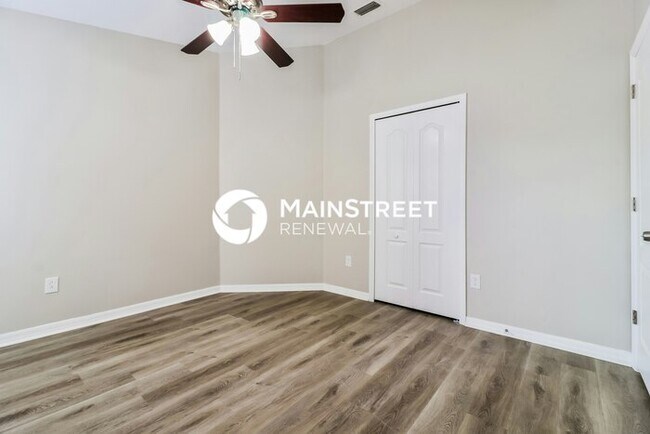 Building Photo - 4 Bedroom Pet-Friendly Home in land o lakes, FL with Main Street Renewal