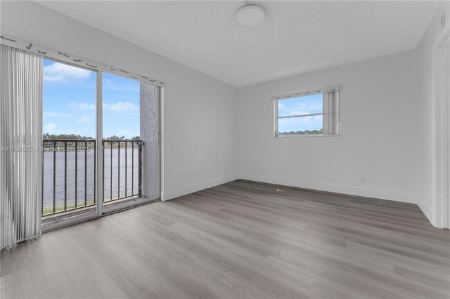 Building Photo - 8560 N Sherman Cir
