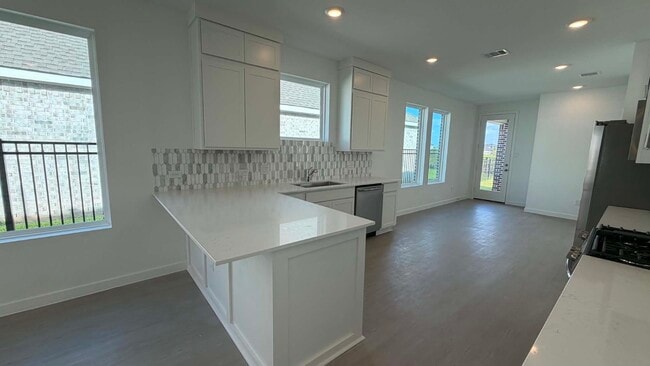 Building Photo - 27451 Sunterra Village Dr